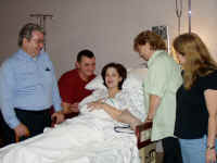 The family celebrates! (L-R: Grandpa, Daddy, Mommy, Grandma, Aunt)